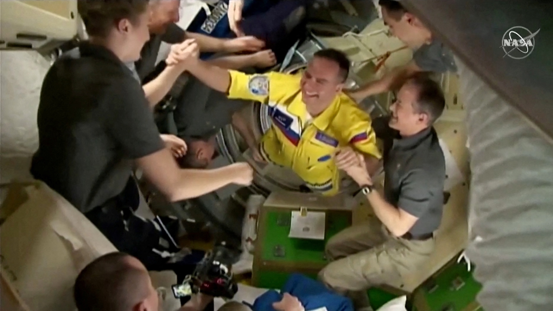 Are Yellow Uniforms Worn by Cosmonauts A Show of Support for Ukraine?