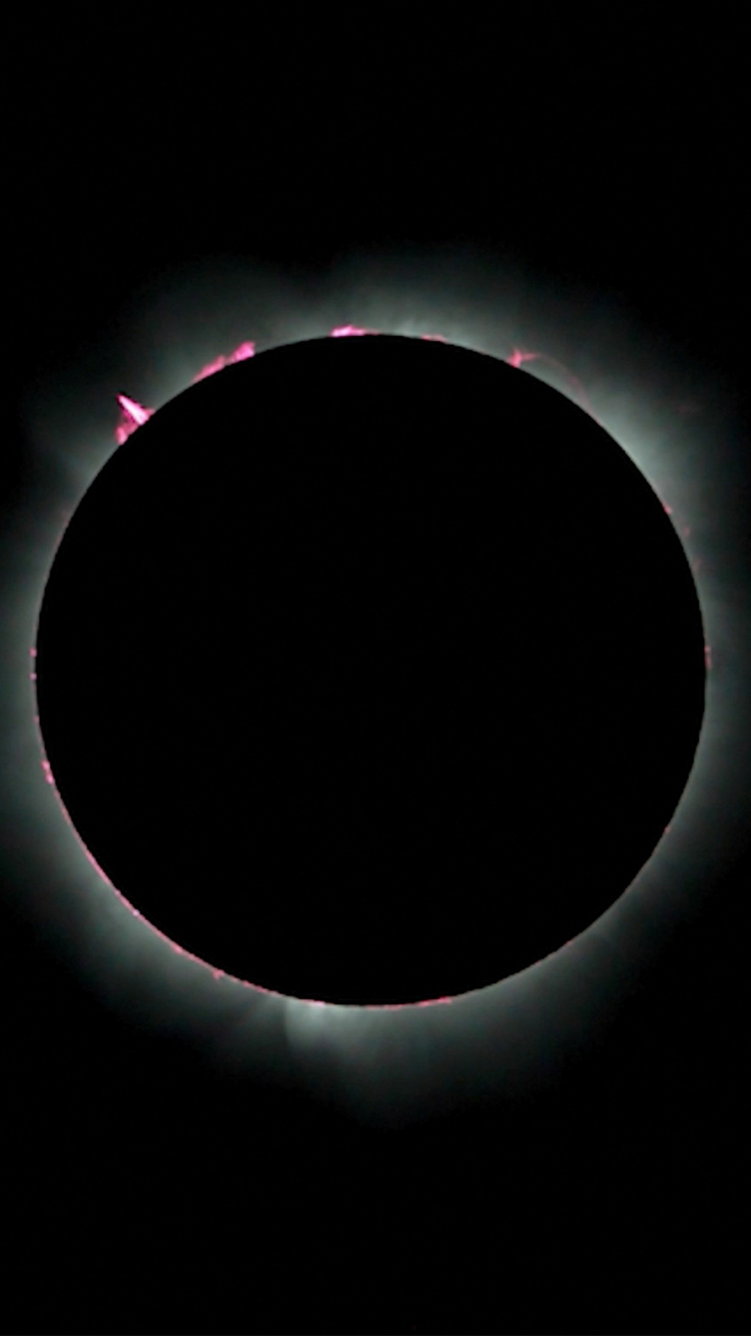 Watch the moment a hybrid solar eclipse reaches totality