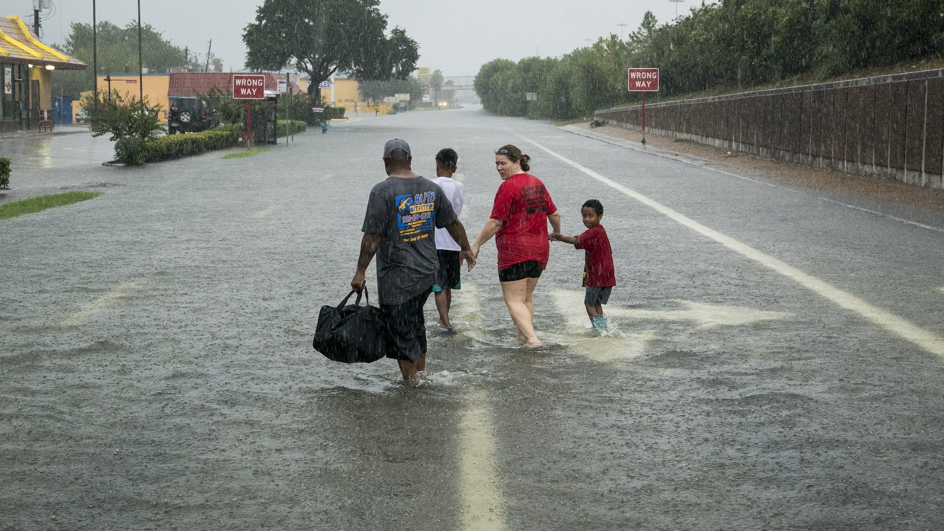 Texans are trying to keep their heads above water as Harvey