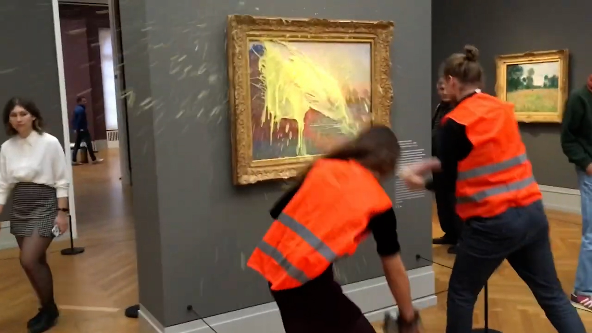 Climate Activists Glue Their Hands To Famous Paintings In Protest