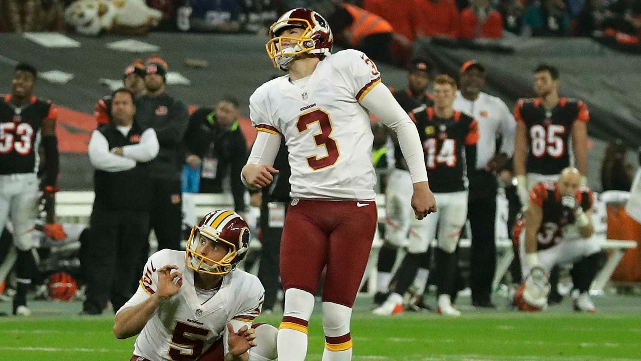 Washington Redskins quarterback Kirk Cousins throws to a receiver in the  first half of a preseason NFL football game against the Cincinnati Bengals,  Sunday, Aug. 27, 2017, in Landover, Md. (AP Pho …