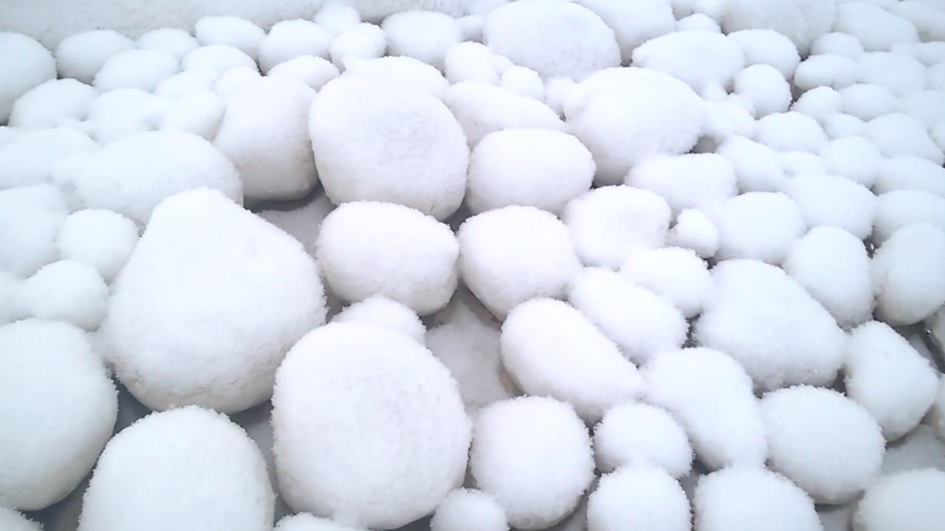 Ice balls, a rare phenomenon, spotted on Lake Michigan