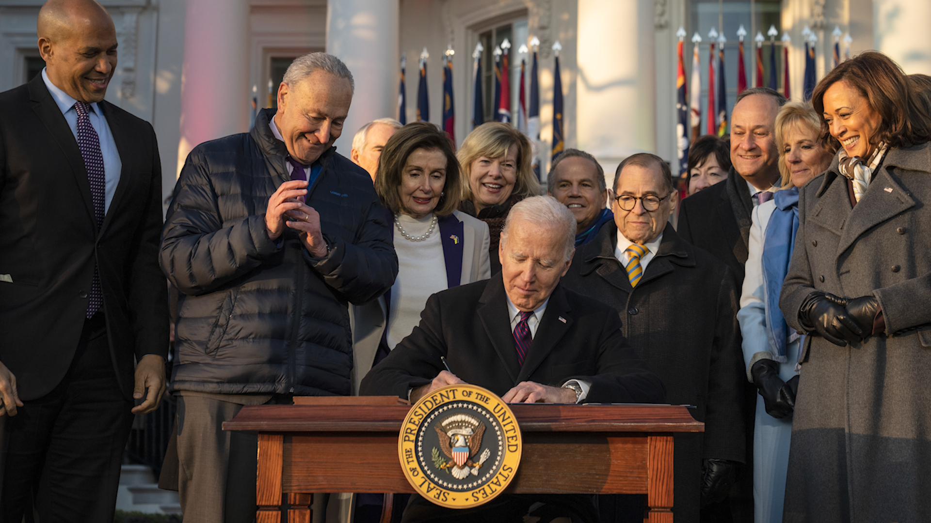 Biden signs Respect for Marriage Act, protecting same-sex, interracial couples photo