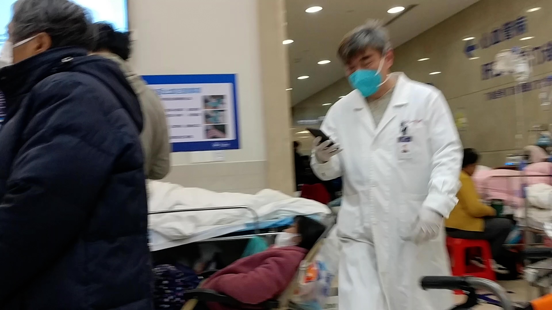 Elderly patients wait at Zhongshan hospital in Shanghai